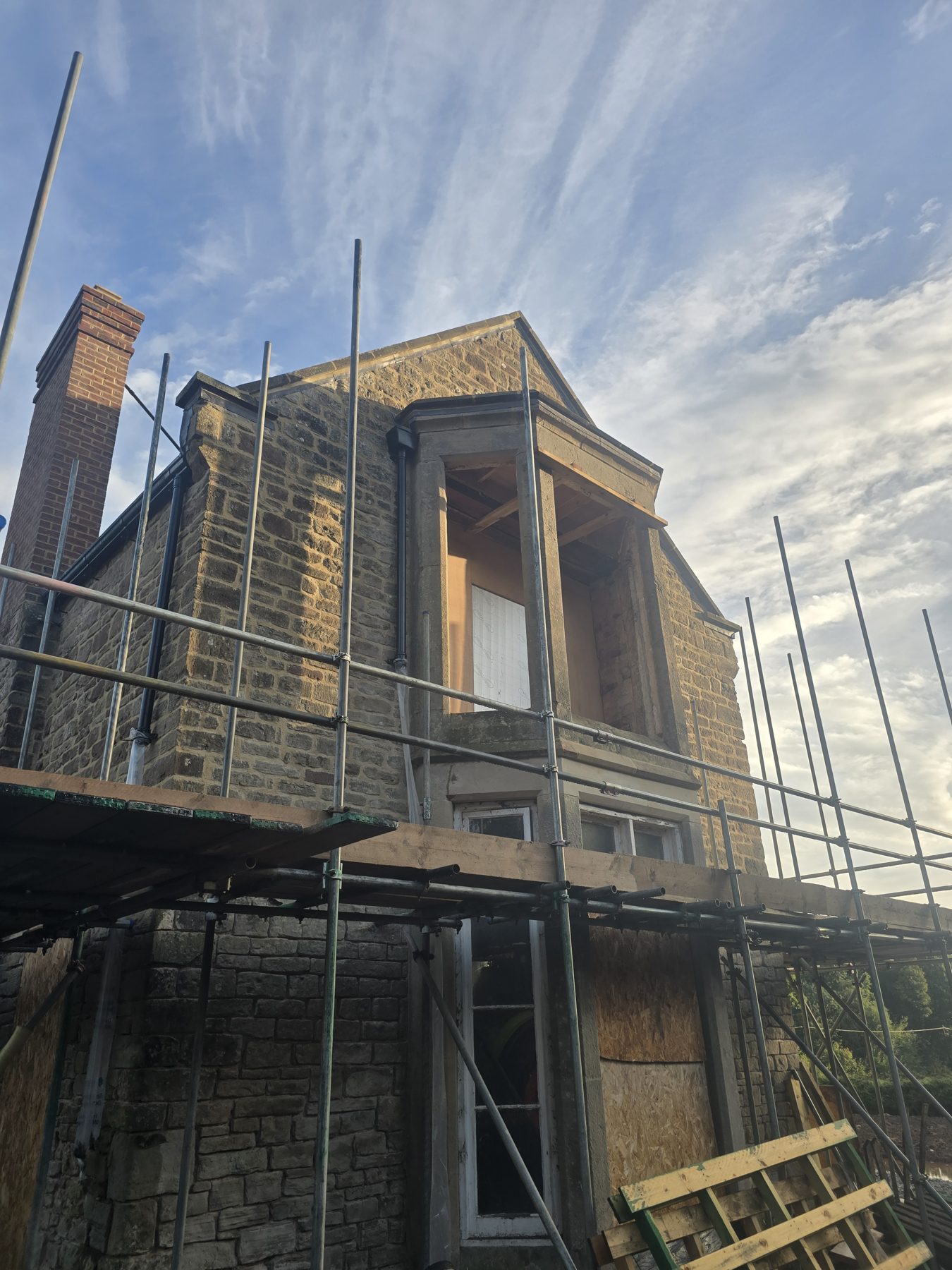Scaffolding around one of the bay windows at Cleobury Court
