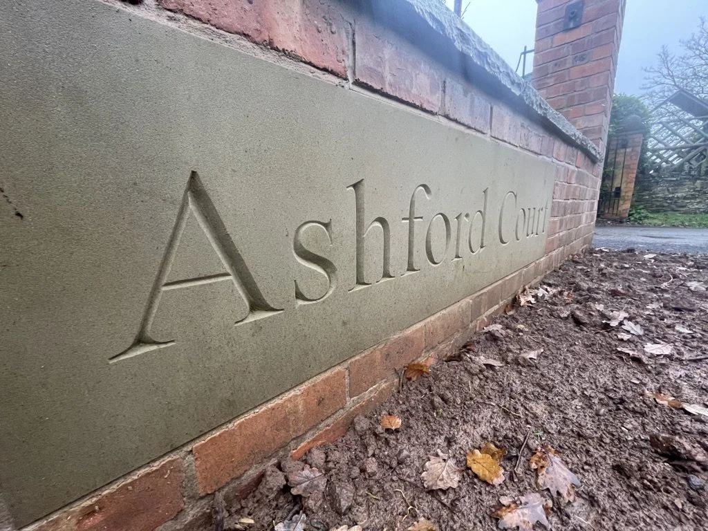 Hand-cut lettering in stone