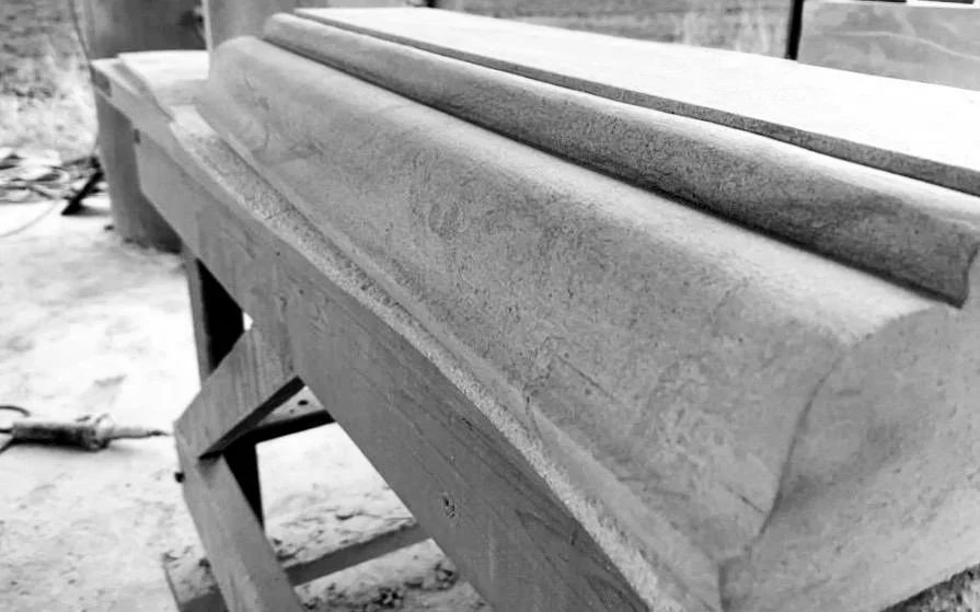 Carved moulding on the workshop bench